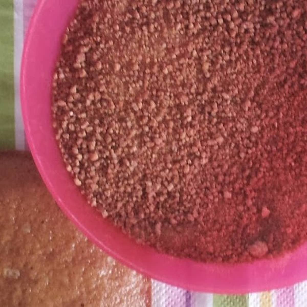 a picture of a pink bowl with brown coconut sugar. The blog post talks about tips for baking with coconut sugar. 