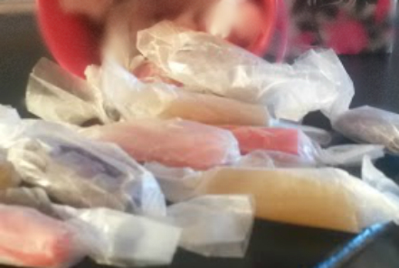 old fashioned salt water taffy wrapped in wax paper 