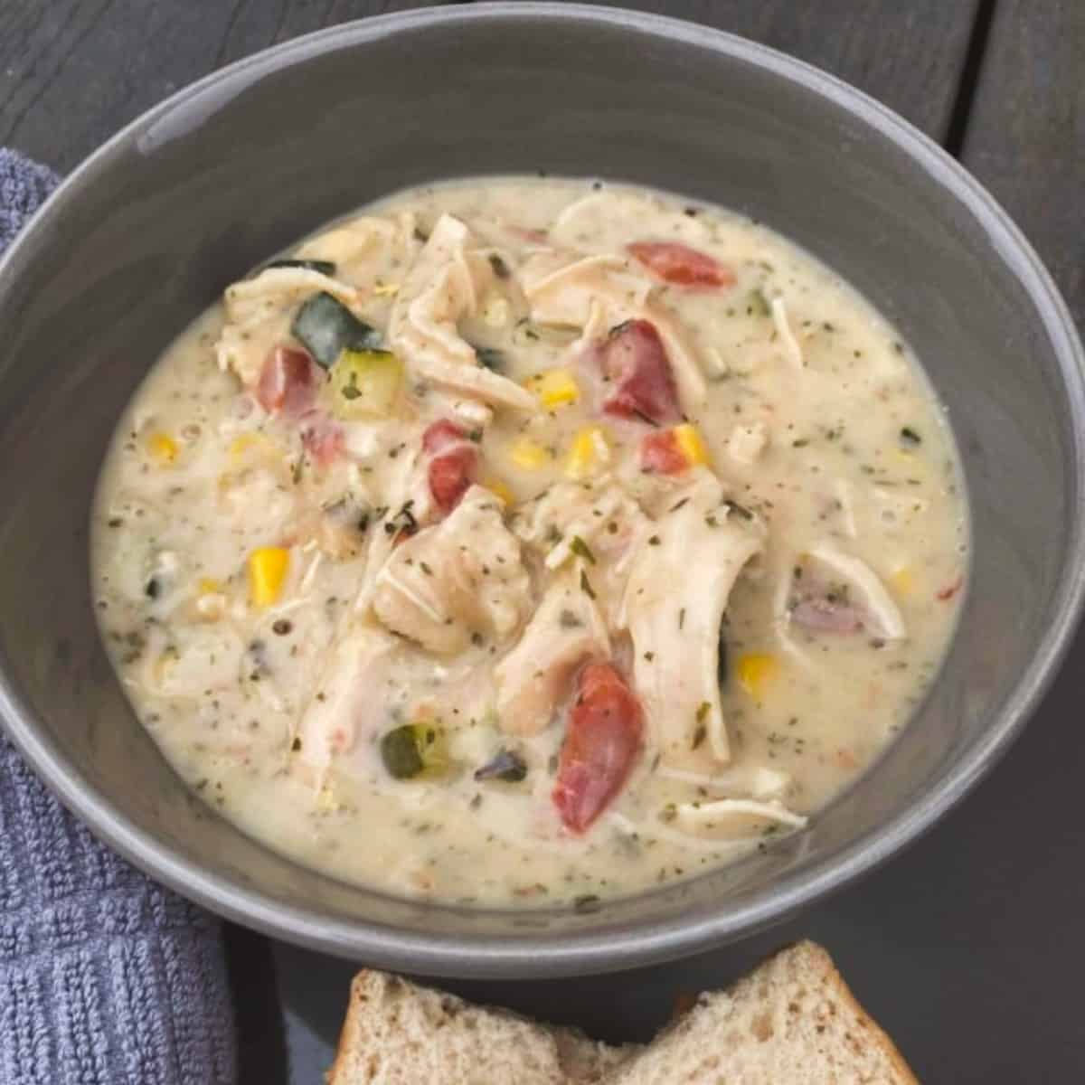 A bowl of Zupas Garden Chowder, which is a creamy chicken chowder with vegetables, corn, herbs and cheese 