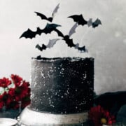 A beautiful Halloween black velvet cake decorated with bats.