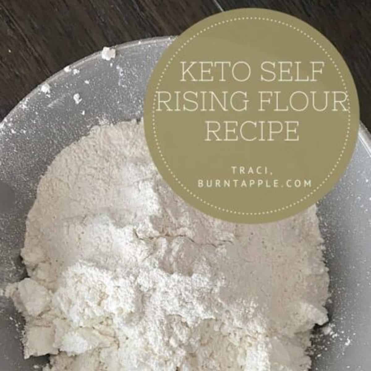 A photo of a white ceramic bowl filled with a pale yellow flour mixture. The words "Keto Self Rising Flour Recipe" are written in black lettering above the bowl on a brown background.