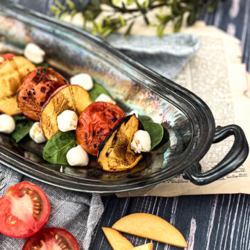 grilled caprese salad made with tomatoes peaches mozzarella basil and vinegar