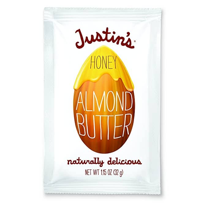 A package of Justin's nut butter squeeze packets, which are a convenient and portable way to enjoy nut butter. The packets are made with 100% natural ingredients and are free of artificial flavors, colors, and preservatives. They are also gluten-free and vegan. 