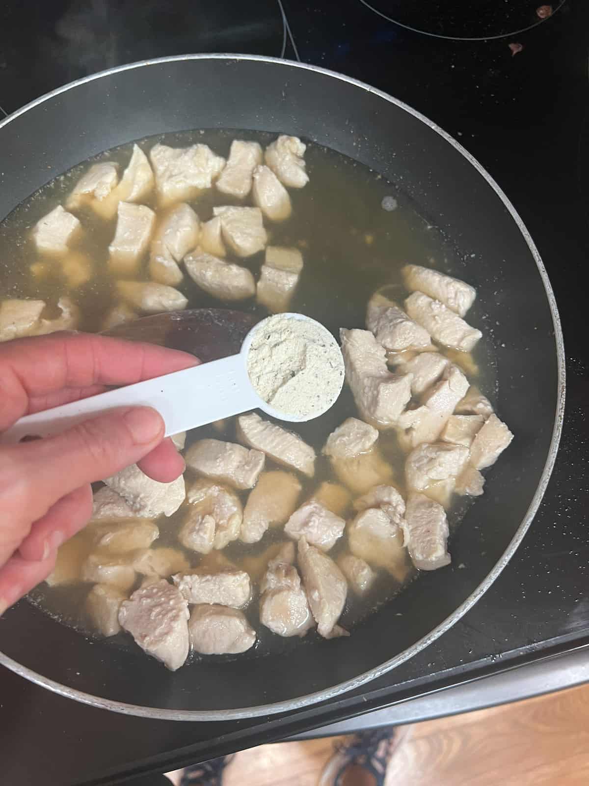 add ingredients to chicken dumpling recipe with biscuits