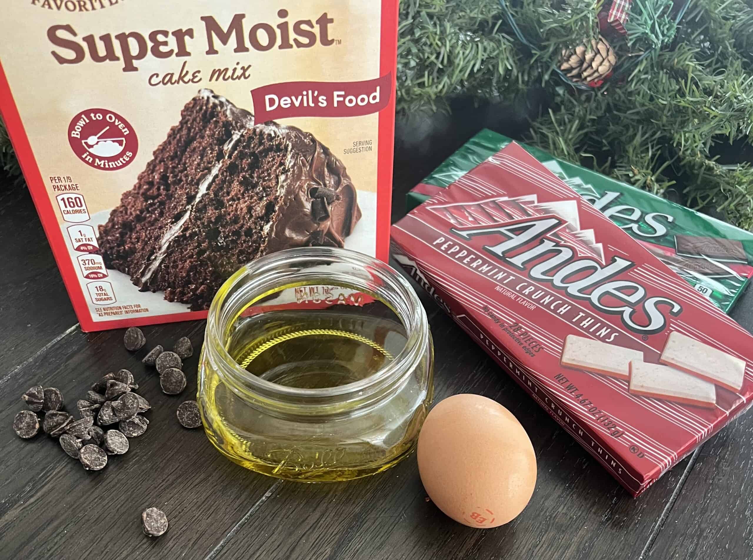 ingredients for mint crinkle cookies include oil, chocolate chips, chocolate cake mix, egg and andes mints