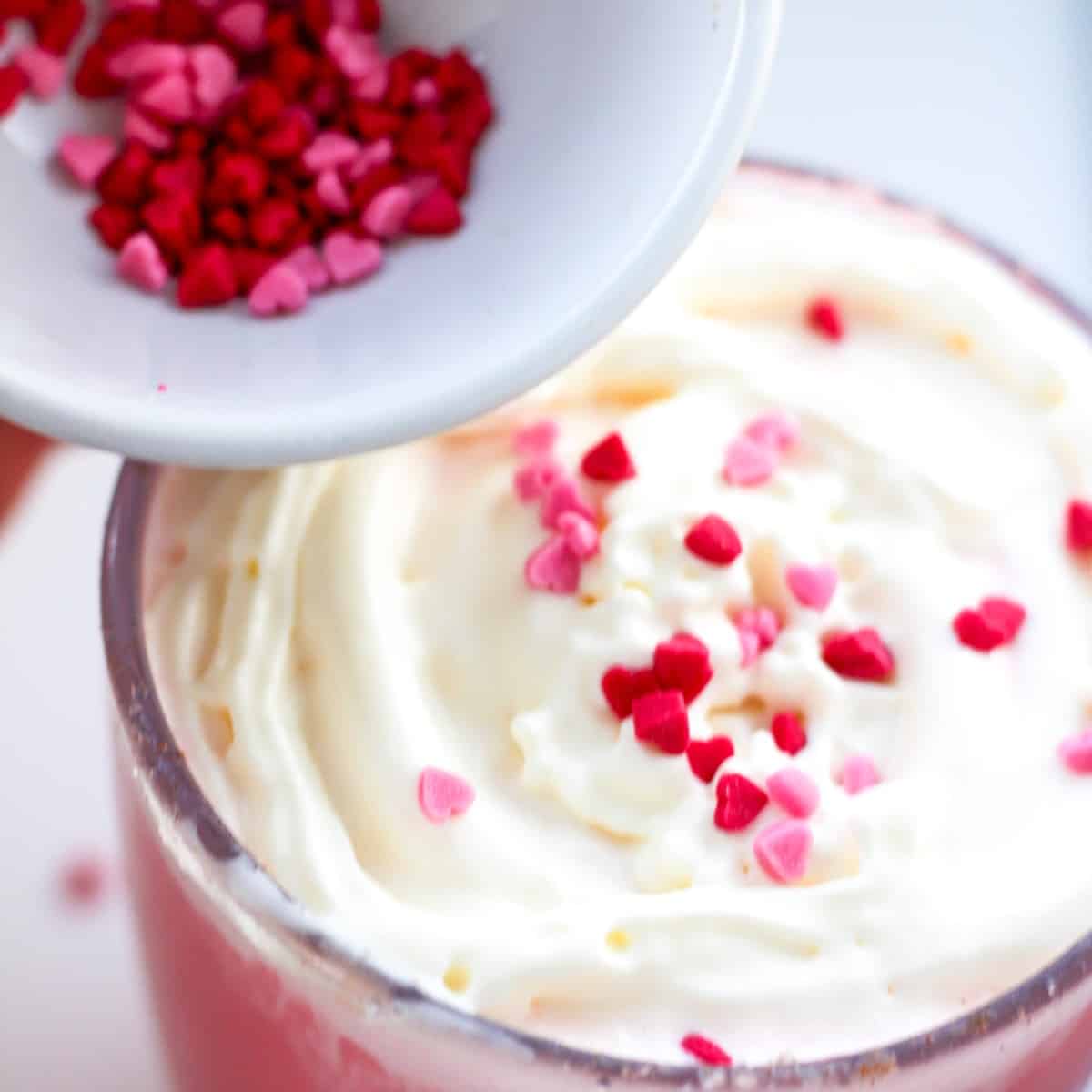 Add sprinkles to your red velvet hot chocolate as a finishing touch