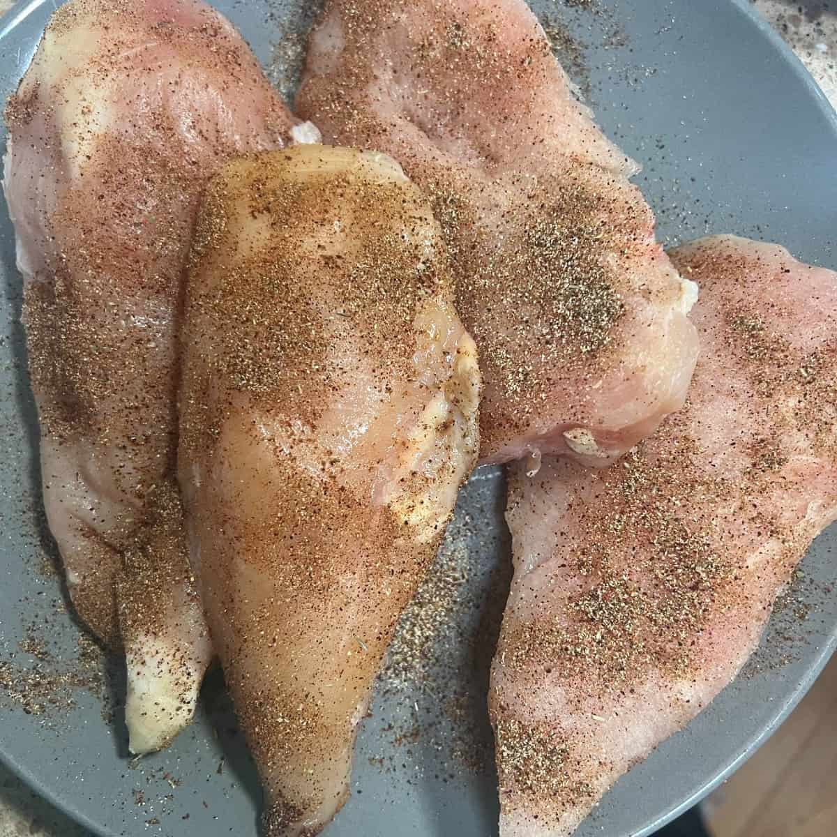 chicken breasts seasoned with cumin, garlic powder and chili powder