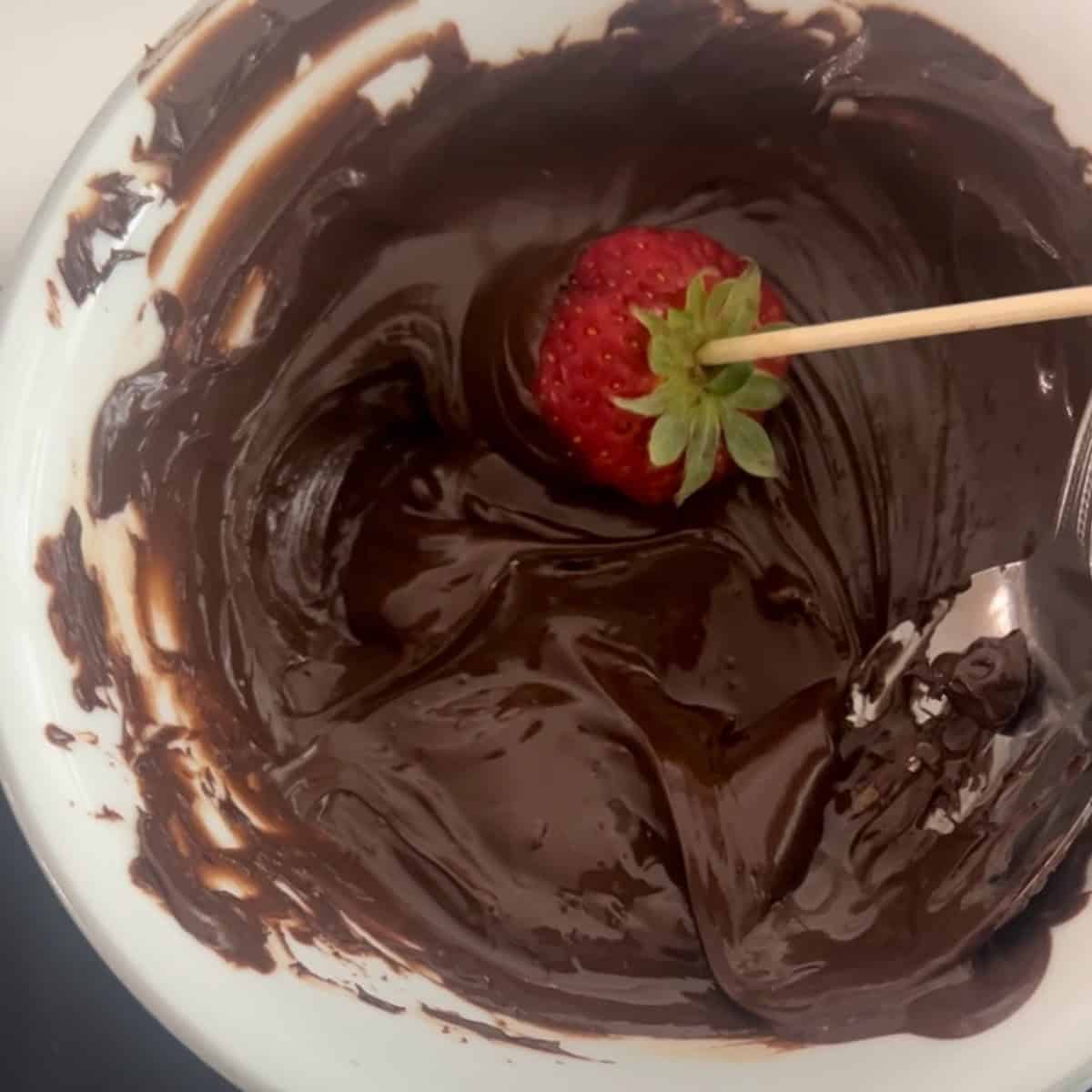 dip strawberries in melted chocolate