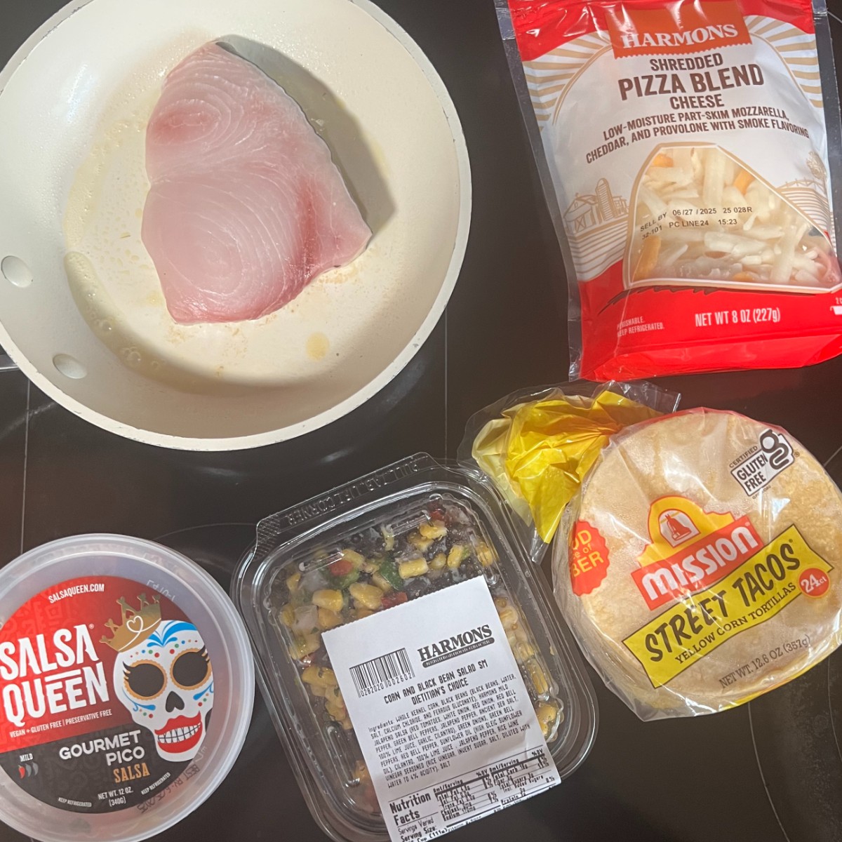 ingredients for swordfish tacos include swordfish fillet, cheese, pico, black bean and corn salsa and corn tortillas